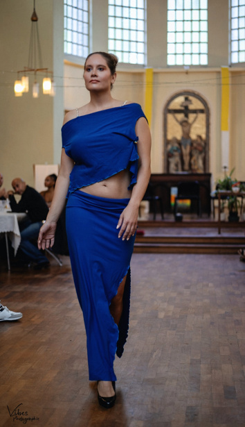 Runway walk in blue dress